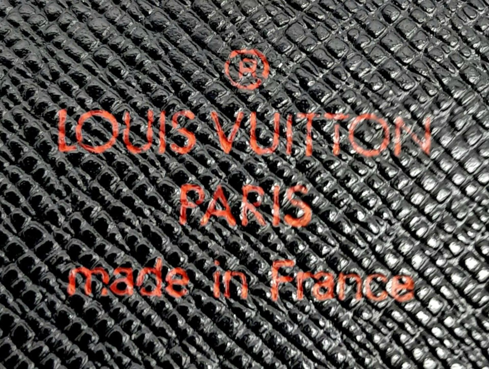 A Louis Vuitton Black 'Sarah' Wallet. Epi leather exterior with the LV logo and press stud - Image 8 of 8