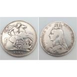 An 1889 Queen Victoria Silver Crown Coin. VF grade but please see photos.