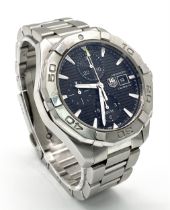 A TAG HEUER AQUARACER CALIBRE 16 AUTOMATIC GENTS WATCH - STAINLESS STEEL BRACELET AND CASE - 44MM.