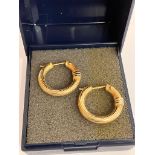 Classic 9 carat GOLD HOOP EARRINGS. Having swirl design with WHITE GOLD contrast detail. Full UK