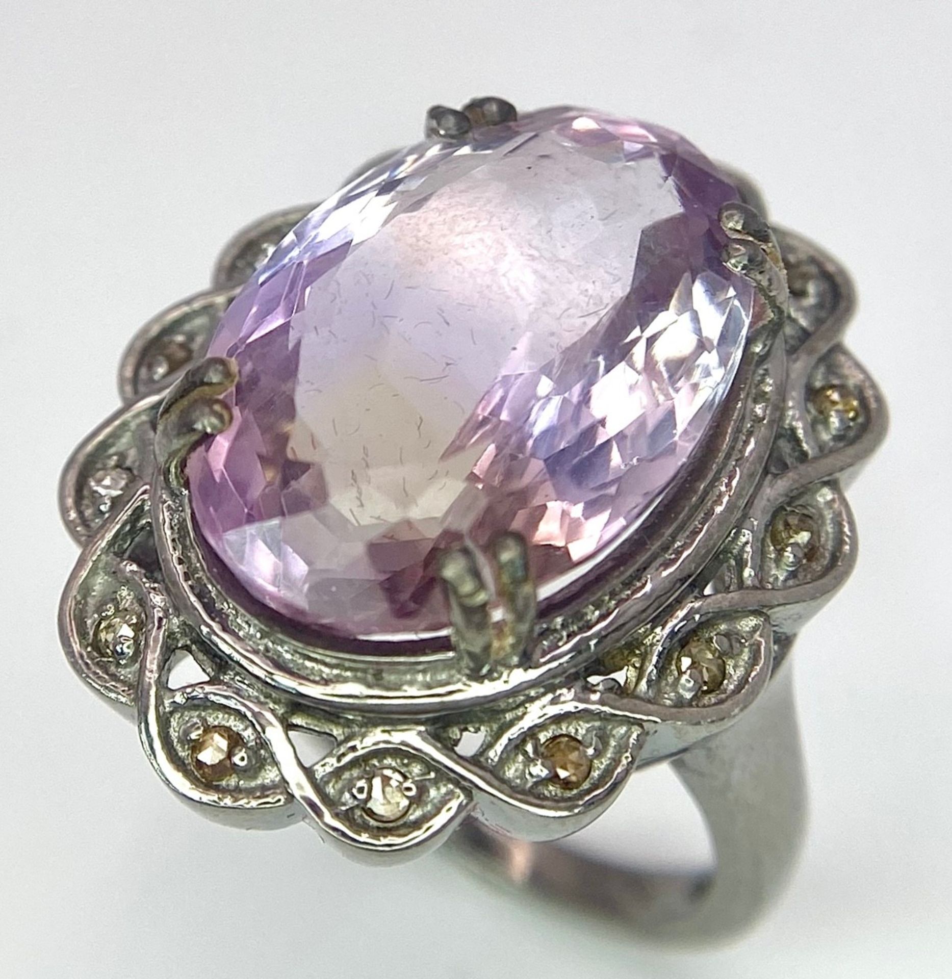 An 11.65ct Amethyst Ring with 0.25ctw of Diamond Accents. Set in 925 Silver. Size N. 9.4g total - Image 4 of 6