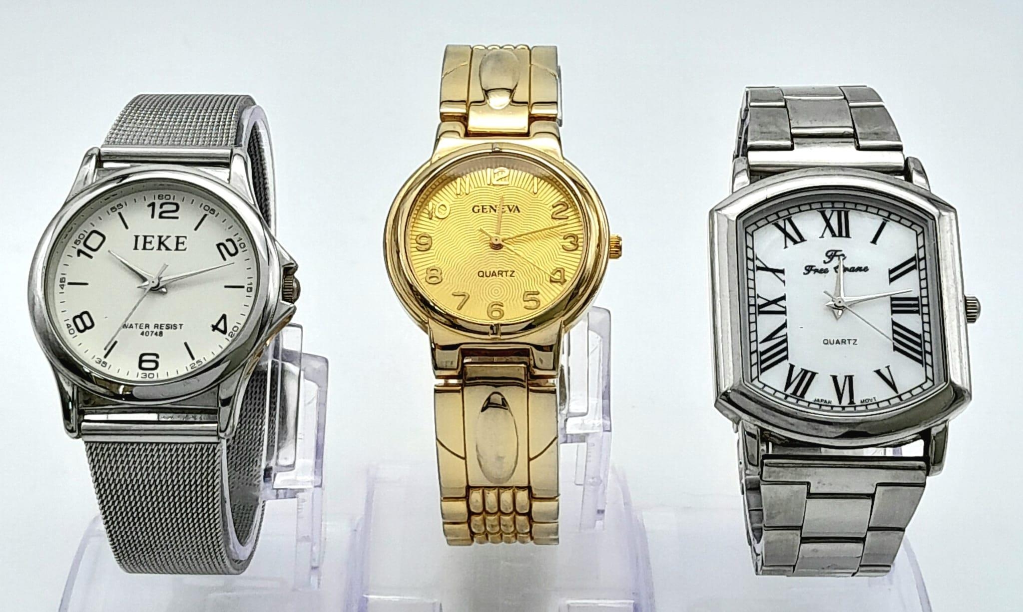 A Parcel of Three Men’s Dress Watches Comprising; 1) A Stainless Steel Tank Style Watch by FC Free