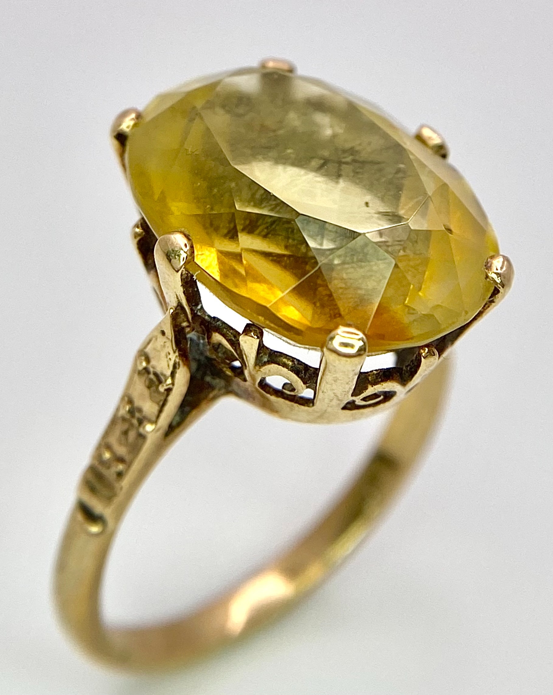 A Vintage 9K Yellow Gold Citrine Ring. 8ct oval cut citrine. Size Q. 5g total weight. - Image 2 of 6