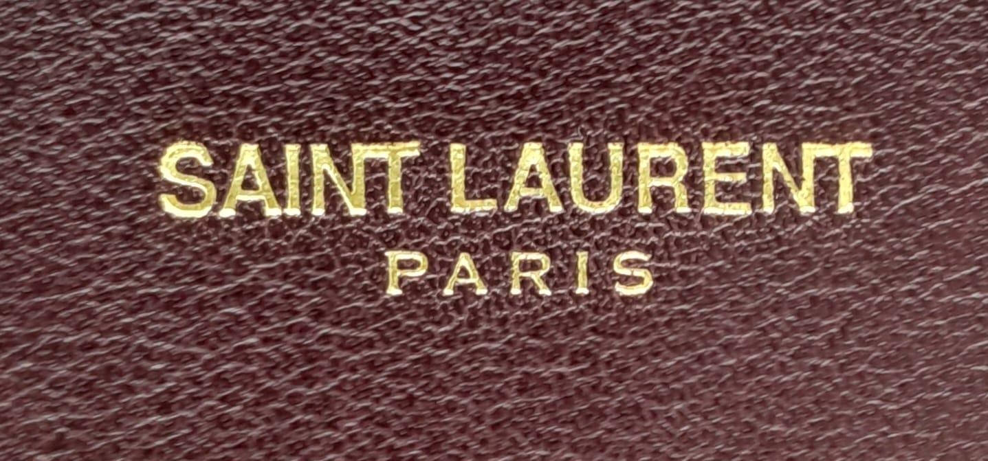 A Saint Laurent Sac De Jour Burgundy Handbag. Leather Exterior, Gold Tone Hardware, Double Handle in - Image 11 of 11