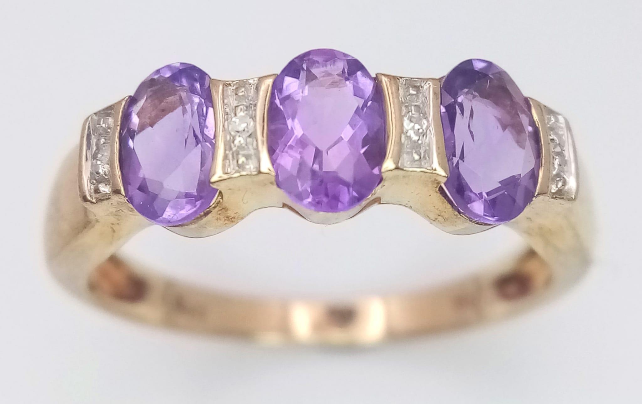 A 9K Yellow Gold Diamond and Amethyst Ring. Size P, 2.5g total weight. Ref: SC 7067