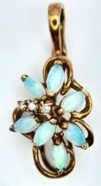 A 9K YELLOW GOLD DIAMOND & OPAL SET VINTAGE PENDANT. 2.7cm length, 1.9g total weight. Ref: SC 8040