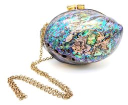 A splendid rare and amazing evening bag, uniquely made from abalone mother of pearl! Supplied with