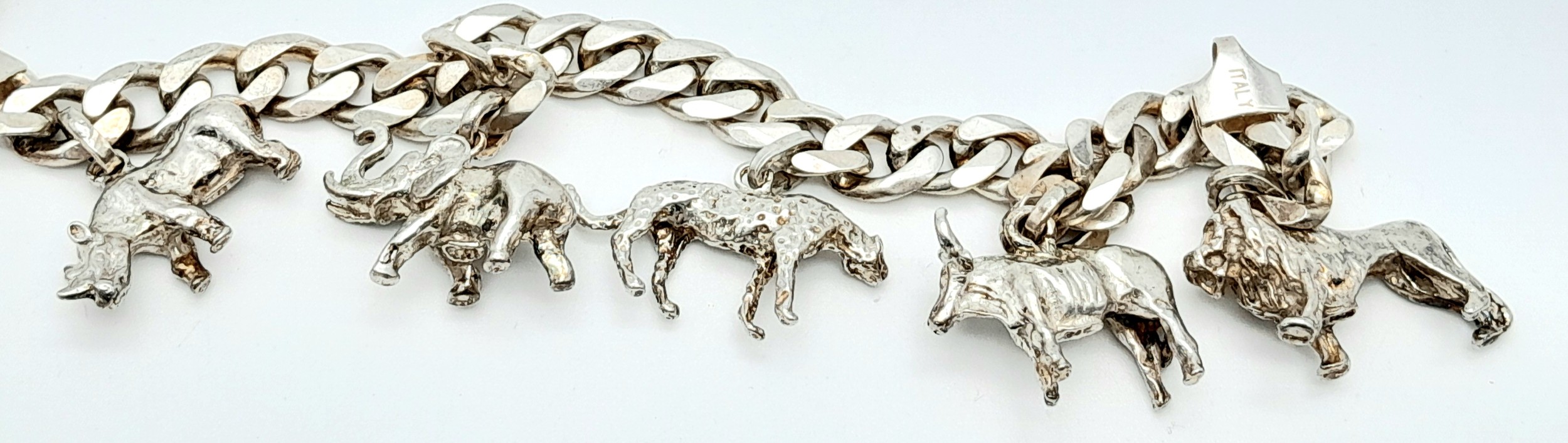 A LOVELY STARTER SILVER CHARM BRACELET WITH 5 ANIMAL CHARMS WAITING TO BE ADDED TO . 38.7gms - Image 2 of 4