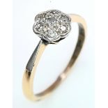 AN 18K YELLOW GOLD & PLATINUM VINTAGE DIAMOND CLUSTER RING. Size R, 3.1g total weight. Ref: SC 8065