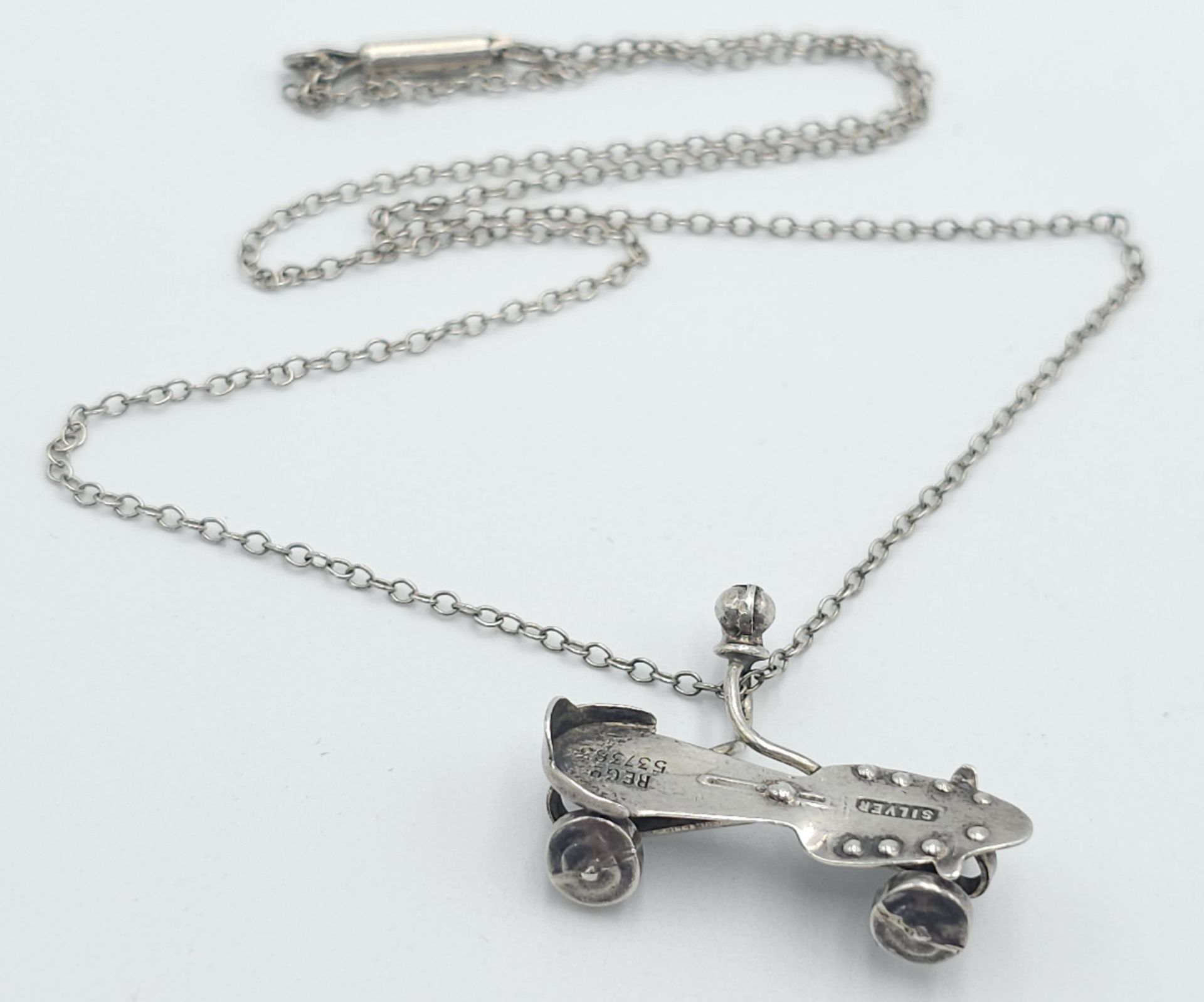 A Vintage Silver Roller Skate Pendant Necklace. 42cm Length. Silver Pendant has a Registered Mark on