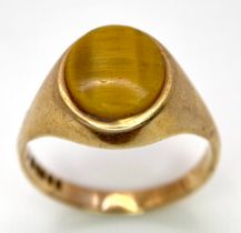 A Vintage 9K Yellow Gold Tigers Eye Ring. Size U. 3.95g total weight.