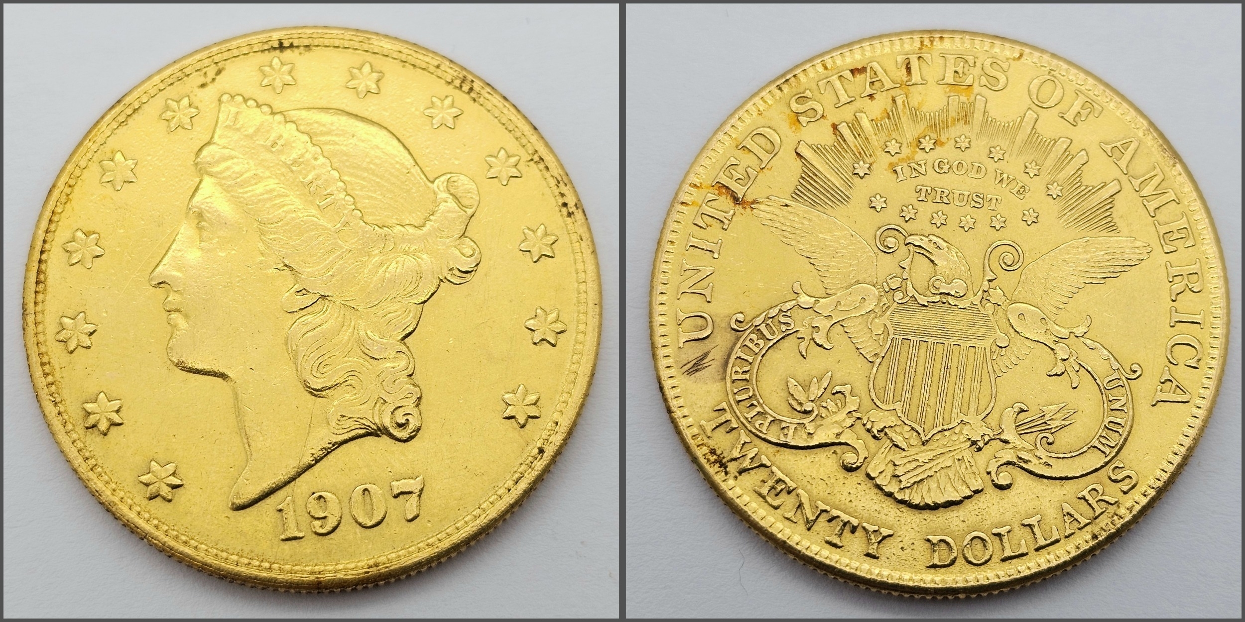 A $20 GOLD LIBERTY COIN DATED 1907 AND WEIGHING 33.43gms THIS COIN IS IN VERY GOOD CONDITION