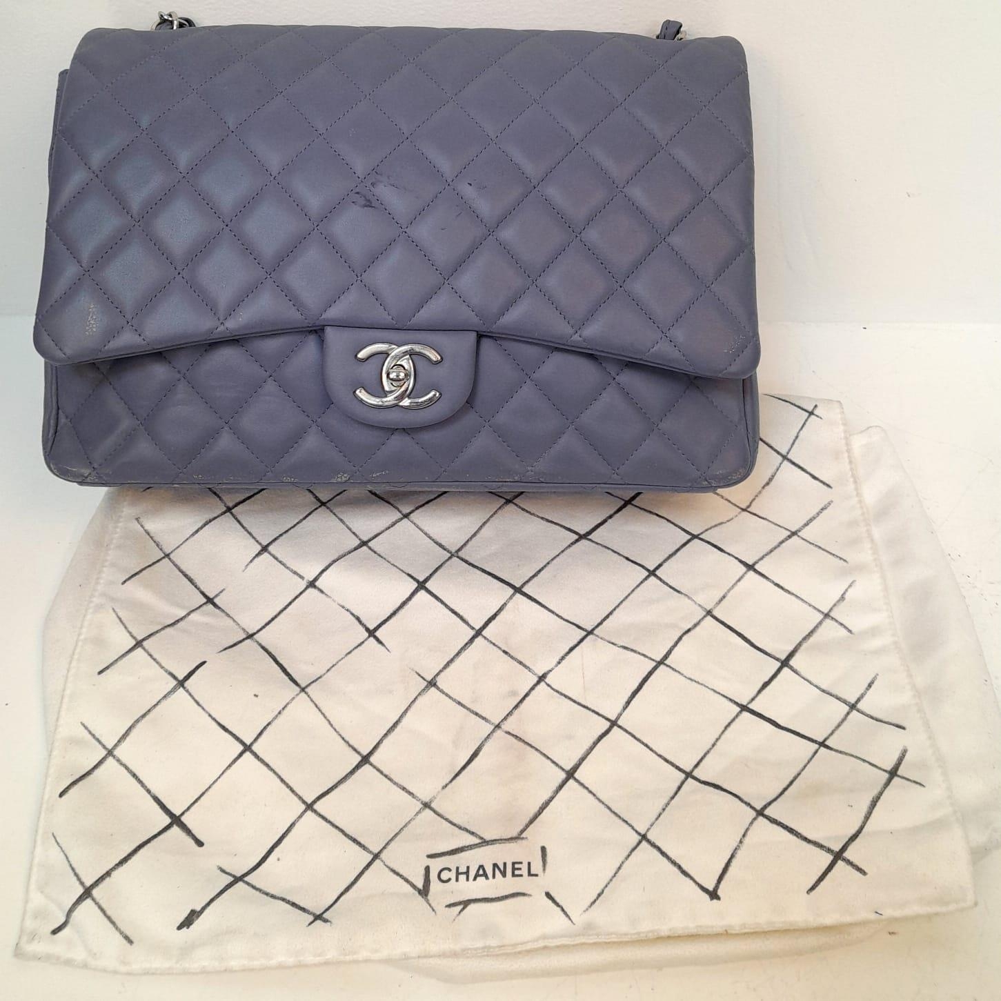 A Chanel Jumbo Double Flap Maxi Bag. Blue quilted caviar leather exterior with a large slip pocket - Image 6 of 14
