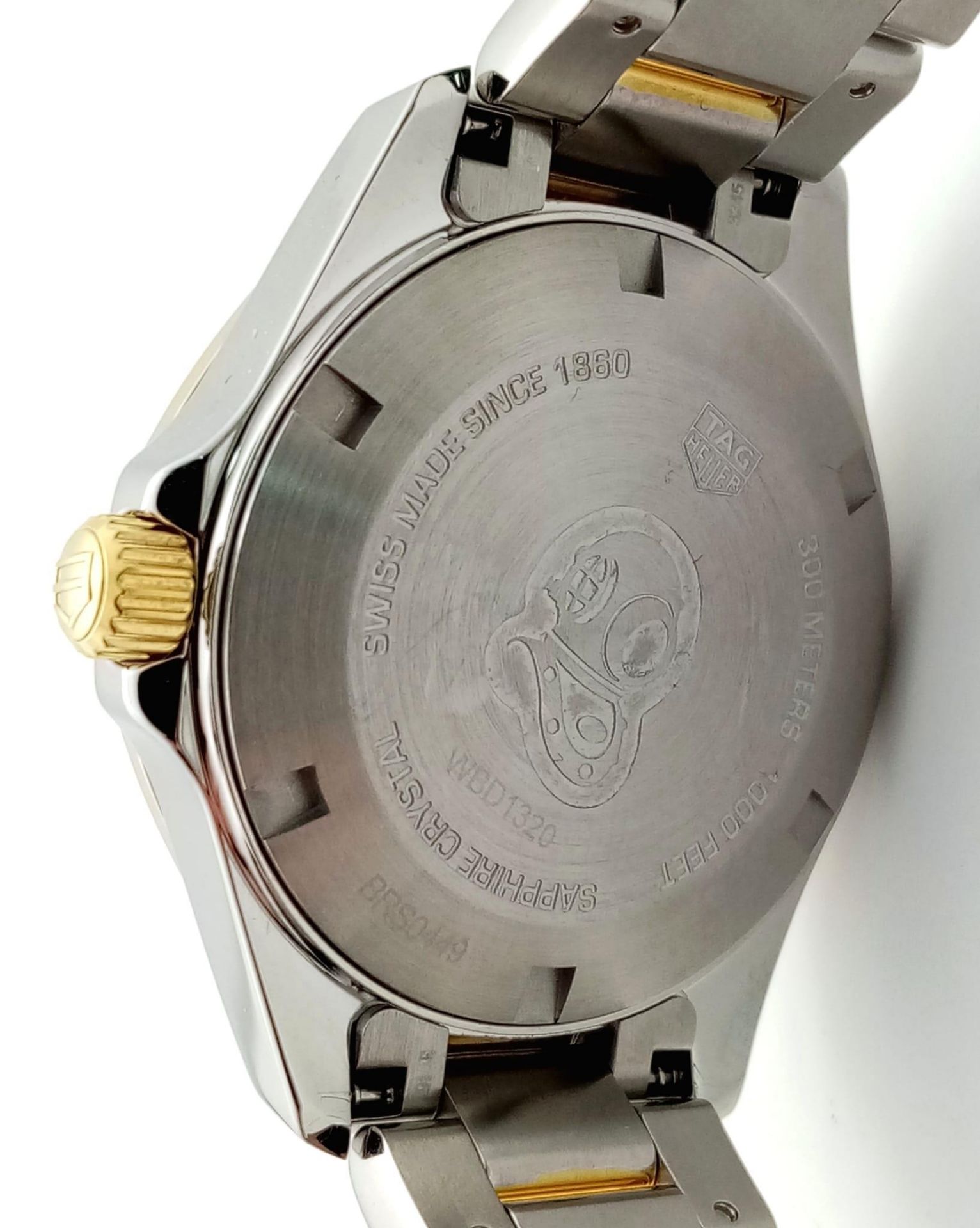 A Tag Heuer Aquaracer Ladies Quartz Watch. Two tone gold plated steel bracelet and case - 32mm. - Image 8 of 13