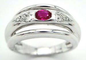 AN 18K WHITE GOLD DIAMOND & RUBY RING. Size N, 6.6g total weight. Ref: SC 8068