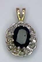 A 9K Yellow and White Gold Sapphire and Diamond Pendant. 2cm. 1.84g total weight