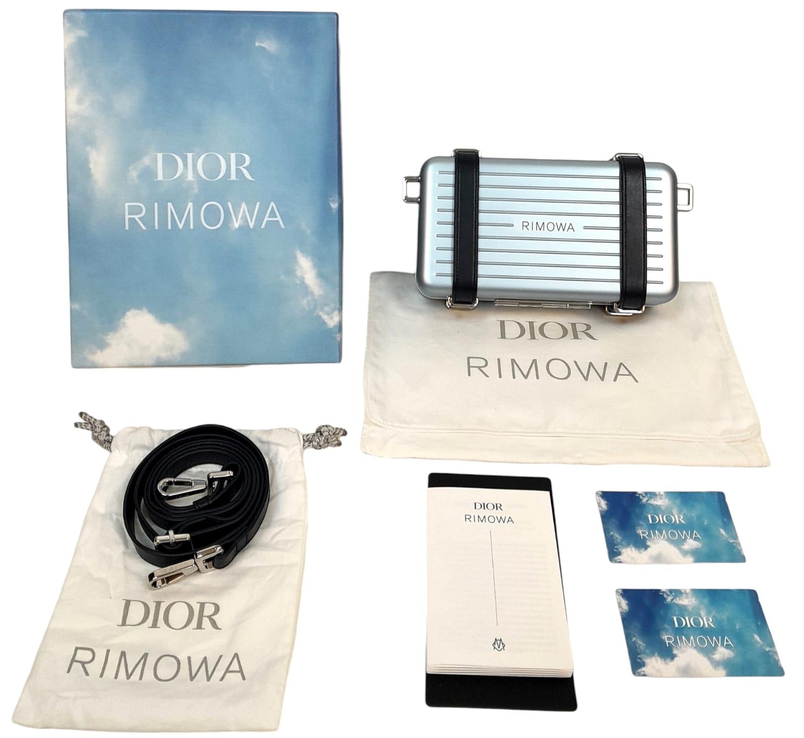 A Christian Dior x Rimowa Collaboration Ice Blue Clutch Bag. Aluminium exterior with silver-toned