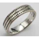 An 18K White Gold Triple Row Diamond Half Eternity Ring. 0.48ctw. Size P. 4.7g total weight.