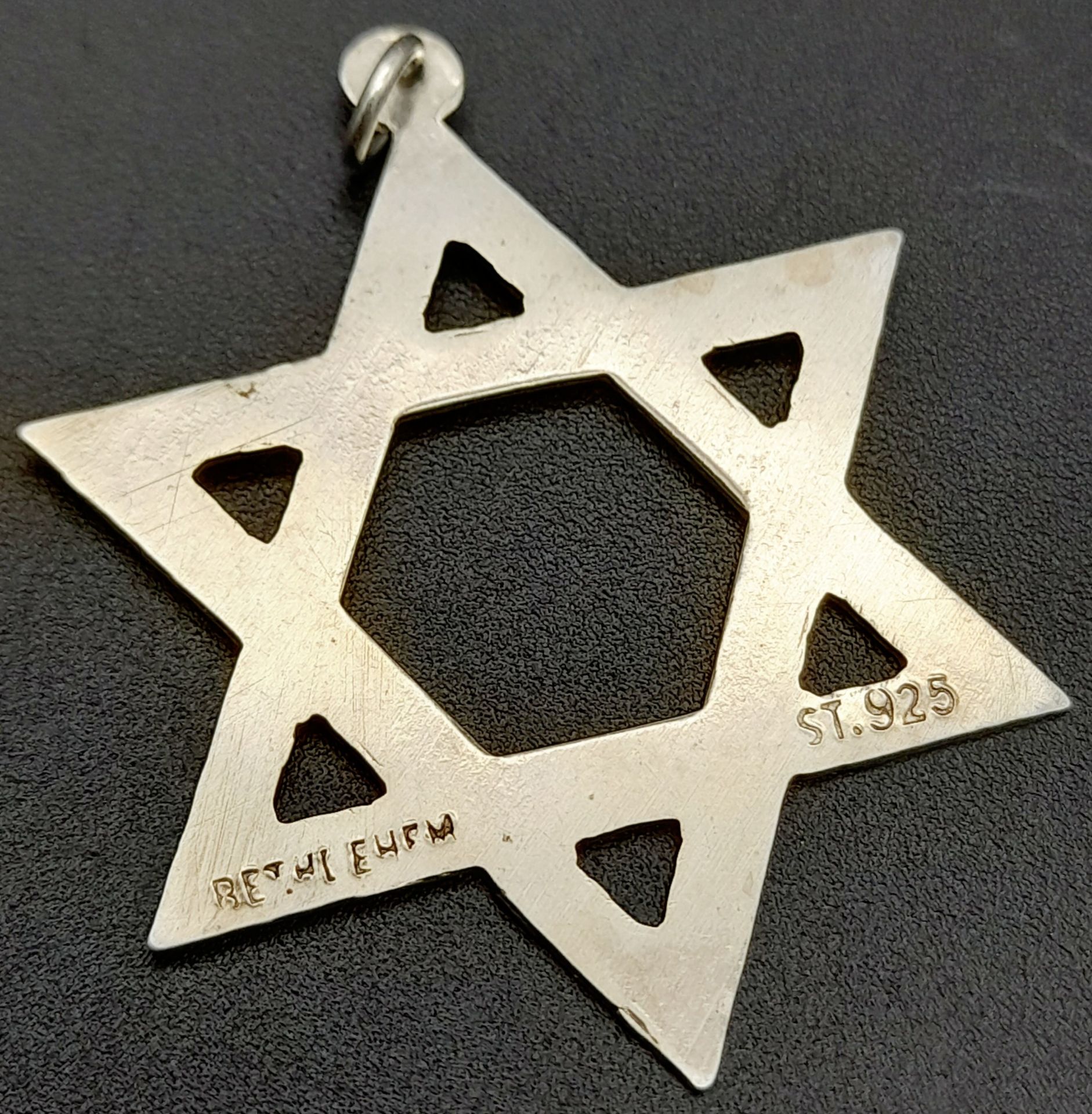 A Silver Star of David Pendant. 3.5cm. Ref: 61001P