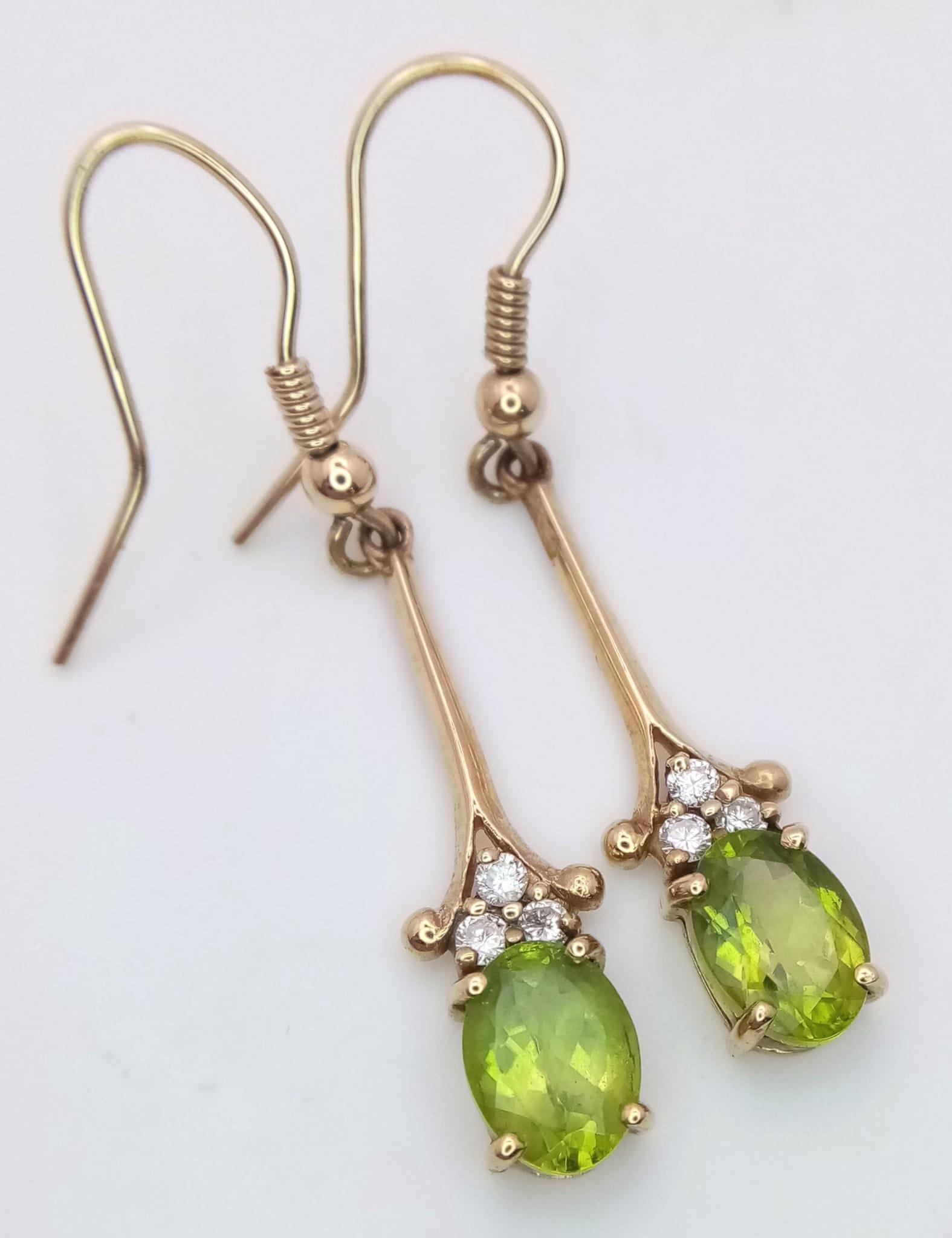 A 9K Yellow Gold, Peridot Drop Earring and Pendant Set. Both decorated with seed pearls. Pendant - - Image 4 of 7