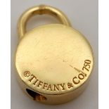 AN 18K YELLOW GOLD TIFFANY & CO FULLY WORKING PADLOCK CHARM. 2cm length, 13.5g total weight. Ref: SC