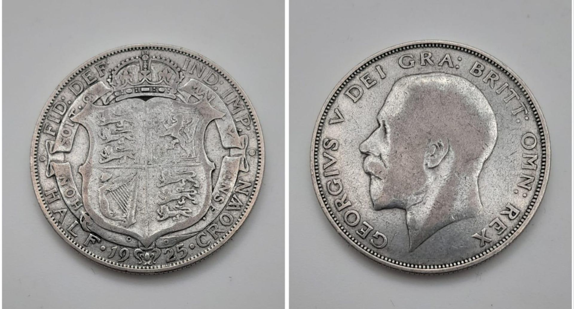 A 1925 Scarce George V Silver Half Crown Coin. VF grade but please see photos.