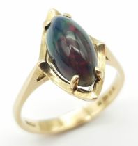 A Vintage 9K Yellow Gold Marquise Cut Opal Ring. Size O. 2.9g total weight.