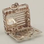 A STERLING SILVER OLD RETRO RADIO CASSETTE PLAYER CHARM, WHICH OPENS TO REVEAL CASSETTE. 2cm length,