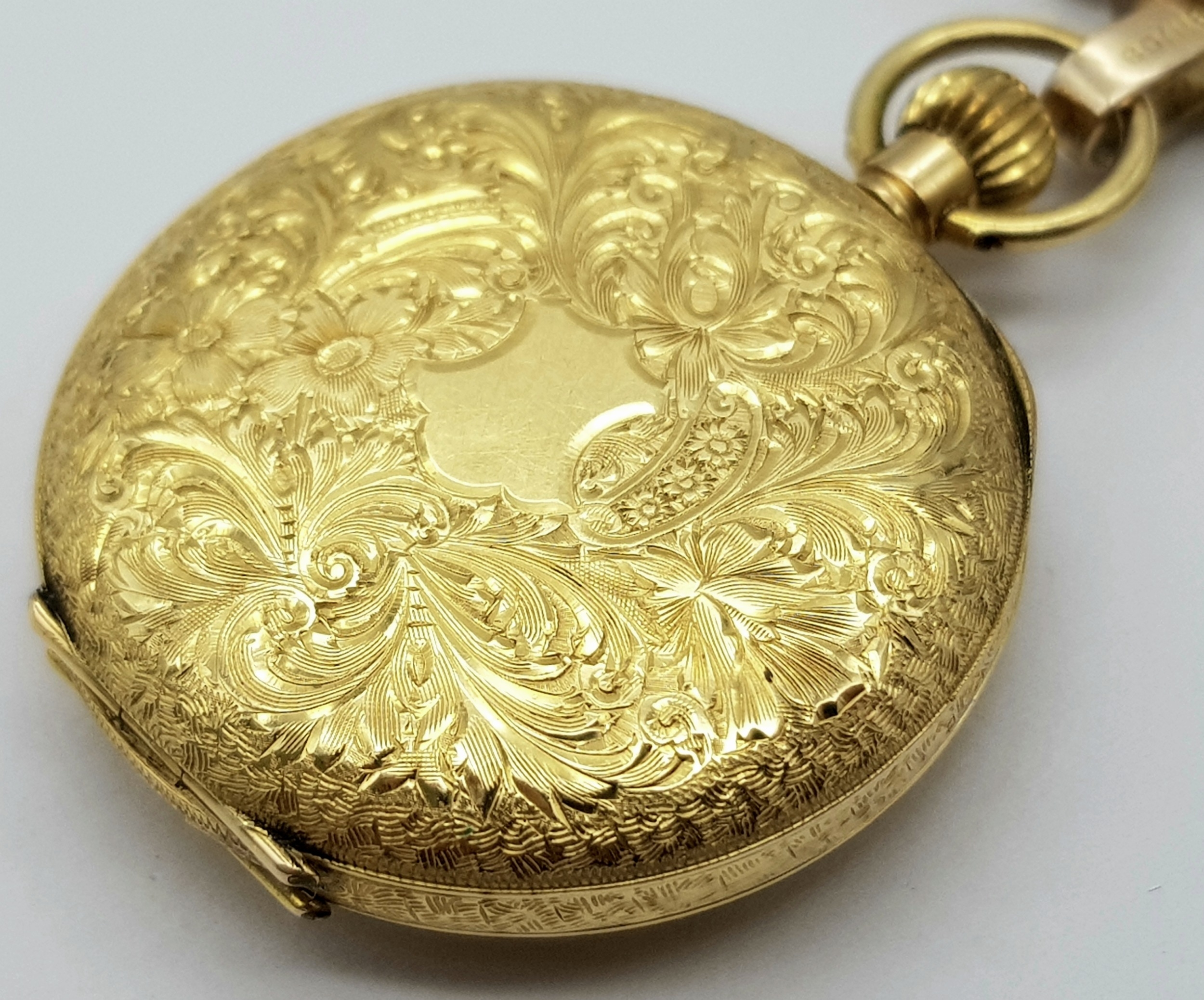 A Vintage 18K Gold Miniature Pocket Watch. A beautifully engraved half-hunter design. Top winder. - Image 9 of 11