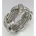 A 9K WHITE GOLD FANCY DIAMOND KISS RING. 0.80ctw, Size K, 6.6g total weight. Ref: SC 8051