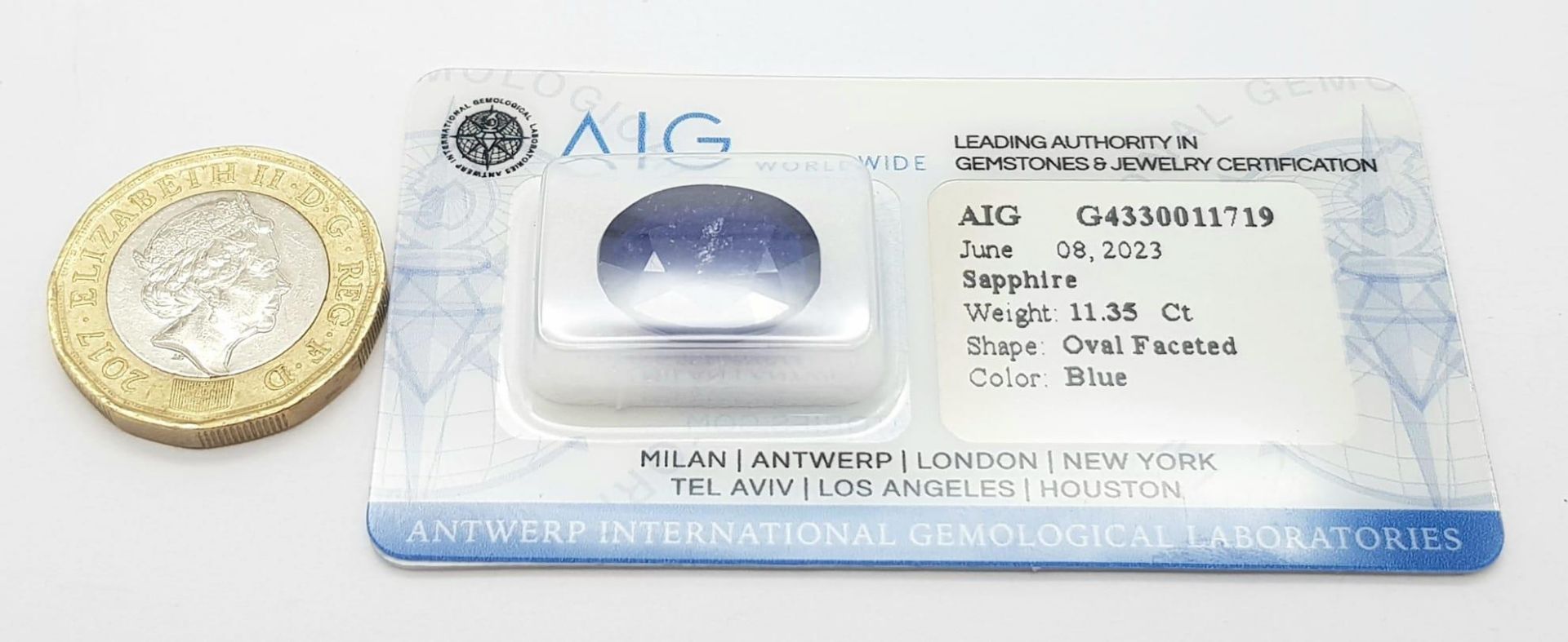 An 11.35ct Blue Sapphire - AIG Milan Certified in a Sealed Container. - Image 3 of 5