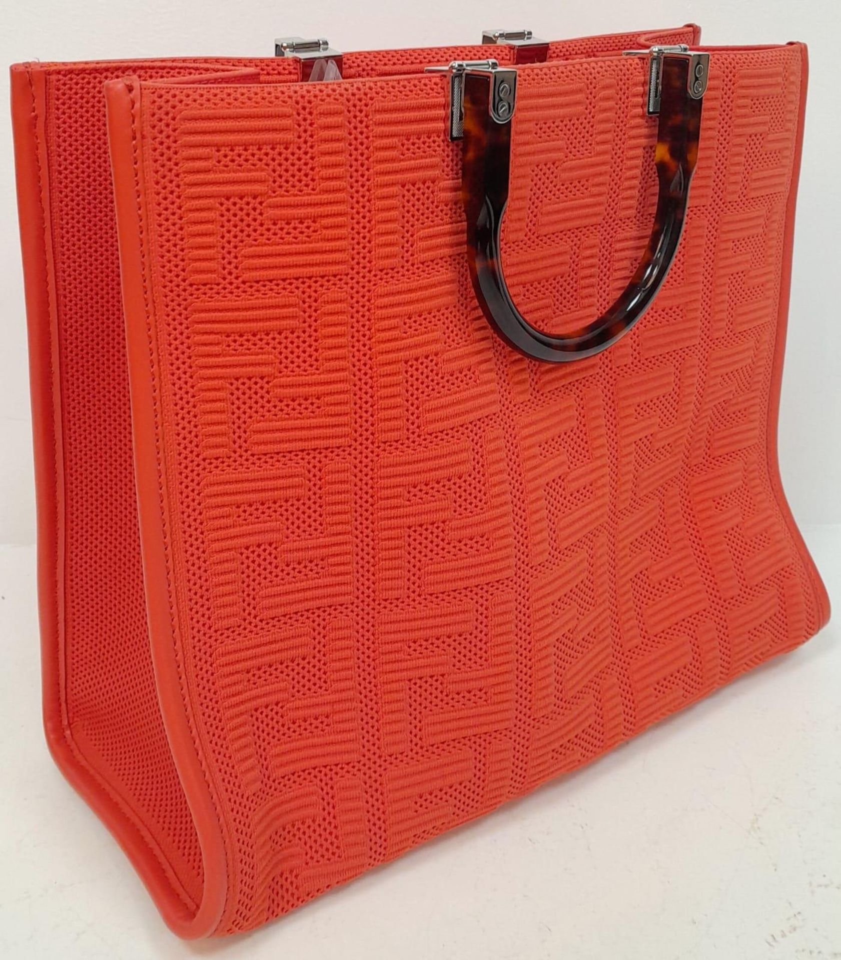 A Fendi Coral Sunshine Tote Bag. Textile exterior with leather trim, silver-toned hardware and two - Image 2 of 7