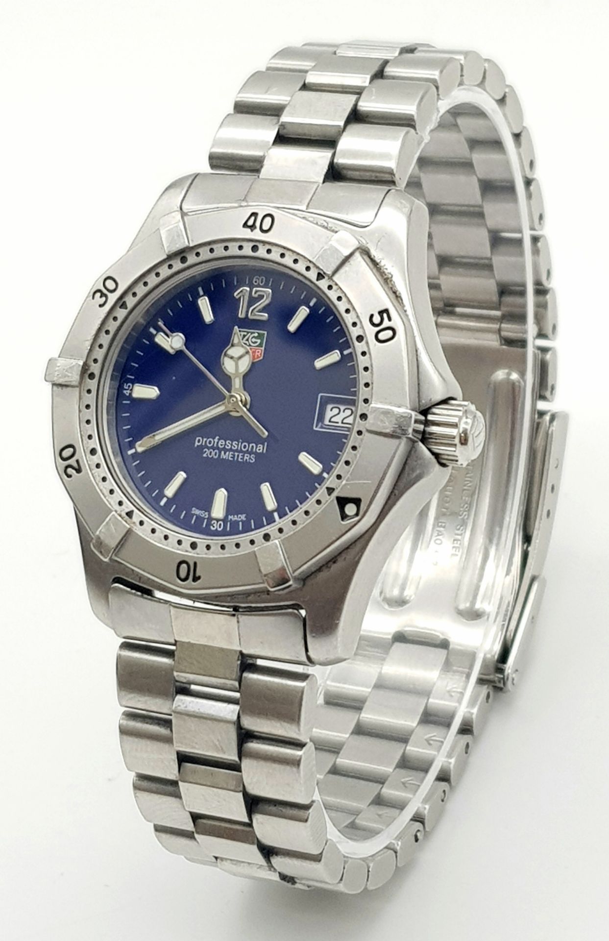 A TAG-HEUER LADIES PROFESSIONAL STAINLESS STEEL WATCH WITH AMAZING NAVY BLUE DIAL . 32mm COMES IN
