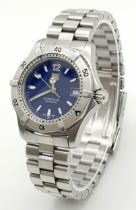 A TAG-HEUER LADIES PROFESSIONAL STAINLESS STEEL WATCH WITH AMAZING NAVY BLUE DIAL . 32mm COMES IN