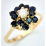 A 9K YELLOW GOLD DIAMOND & SAPPHIRE RING. Size L, 1.9g total weight. Ref: SC 8017