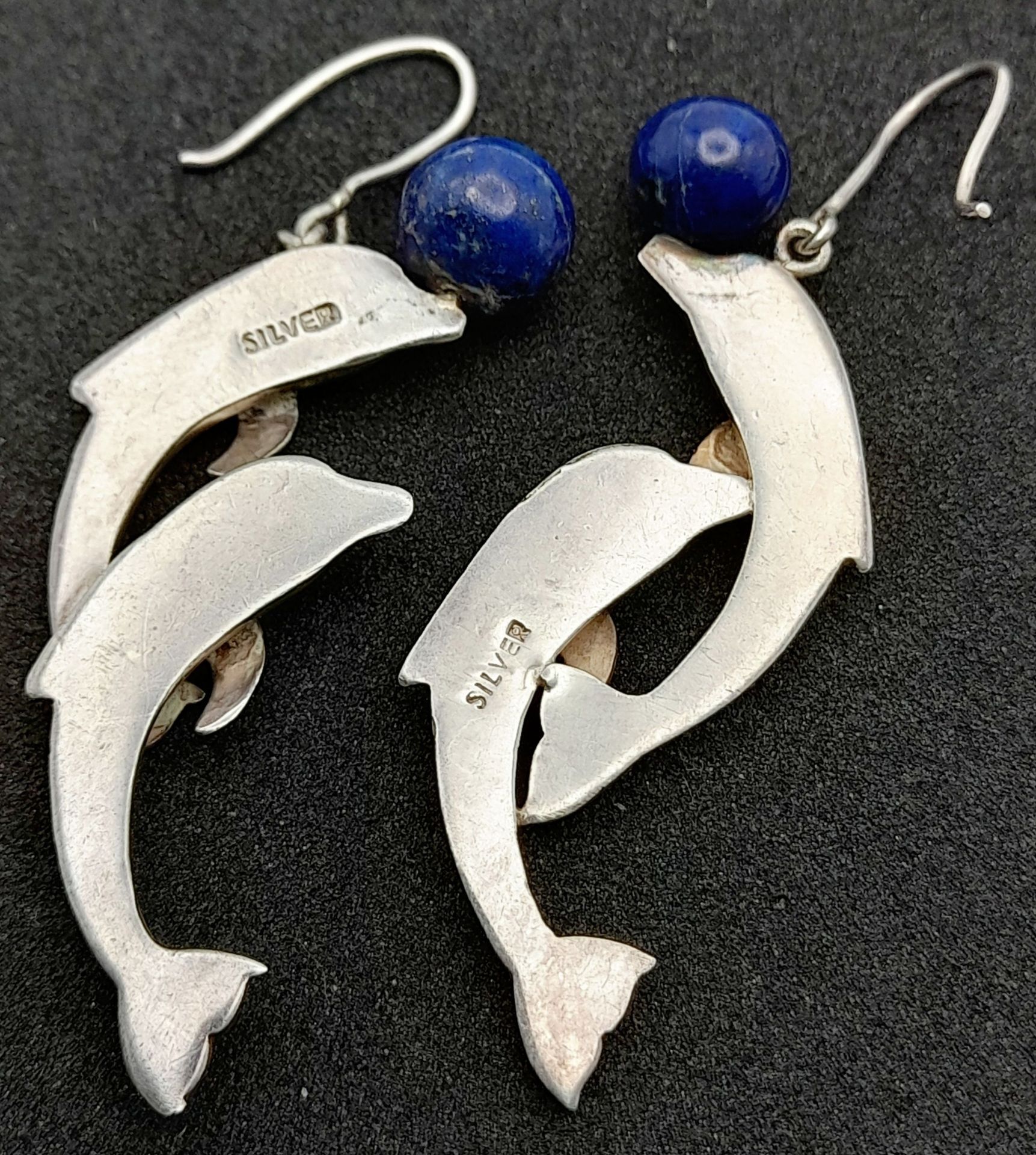 A Pair of Sterling Silver Lapis Lazuli Leaping Dolphin Earrings. 5.5cm Length. - Image 3 of 4