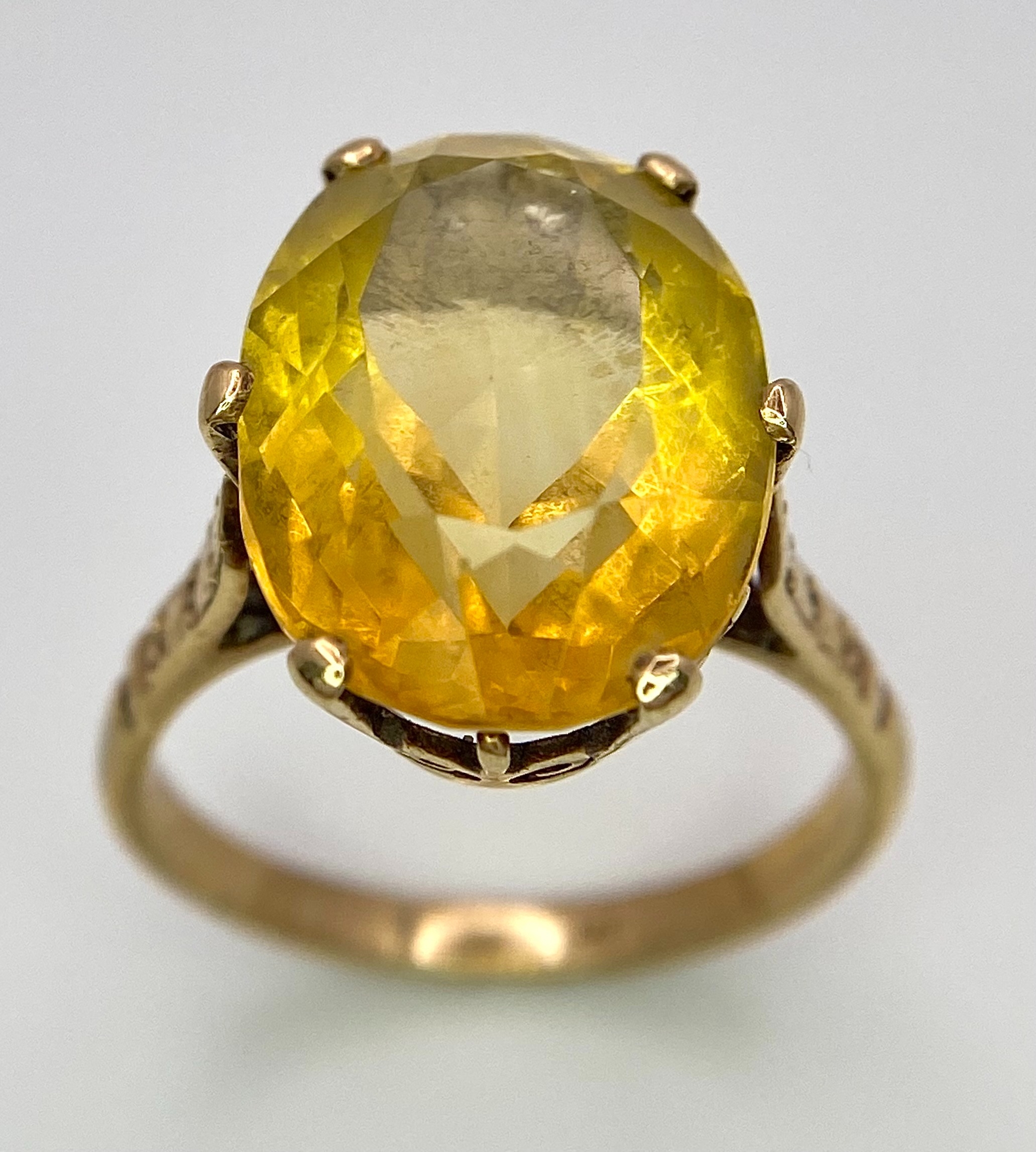 A Vintage 9K Yellow Gold Citrine Ring. 8ct oval cut citrine. Size Q. 5g total weight. - Image 4 of 6