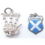 2 X STERLING SILVER SCOTLAND THEMED CHARMS - SCOTTISH FLAG AND BAGPIPES. 1.8cm and 3cm length. 3.