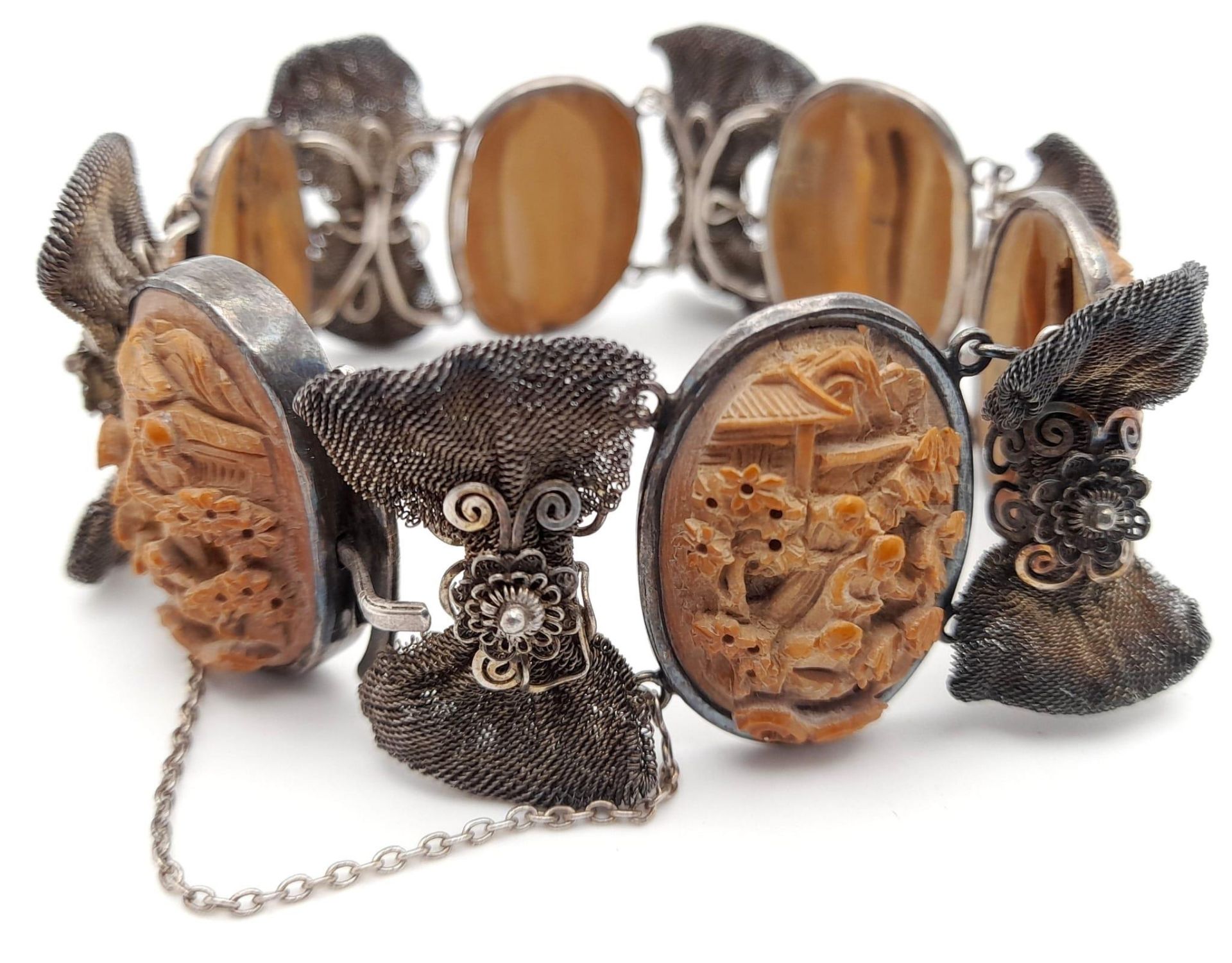 An Antique Victorian Carved Lava and Silver Bracelet. Beautifully crafted in high relief. 18cm