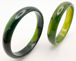 Two top quality, highly polished, spinach green jade bangles, 68 mm inner diameter, each in gift