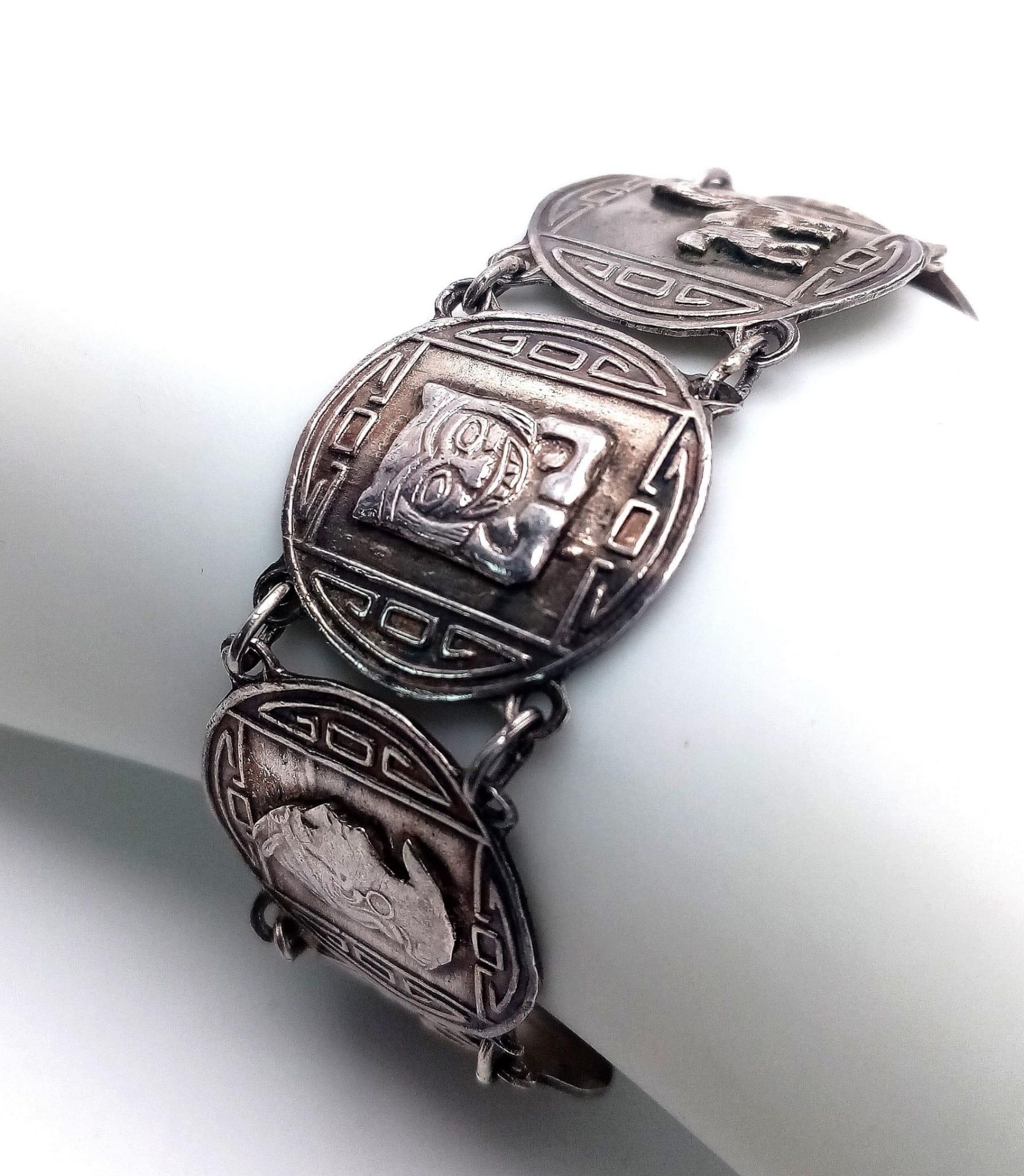 A Silver Fancy Aztec Bracelet with Safety Chain. 19cm length, 26.2g total weight. Ref: 8065