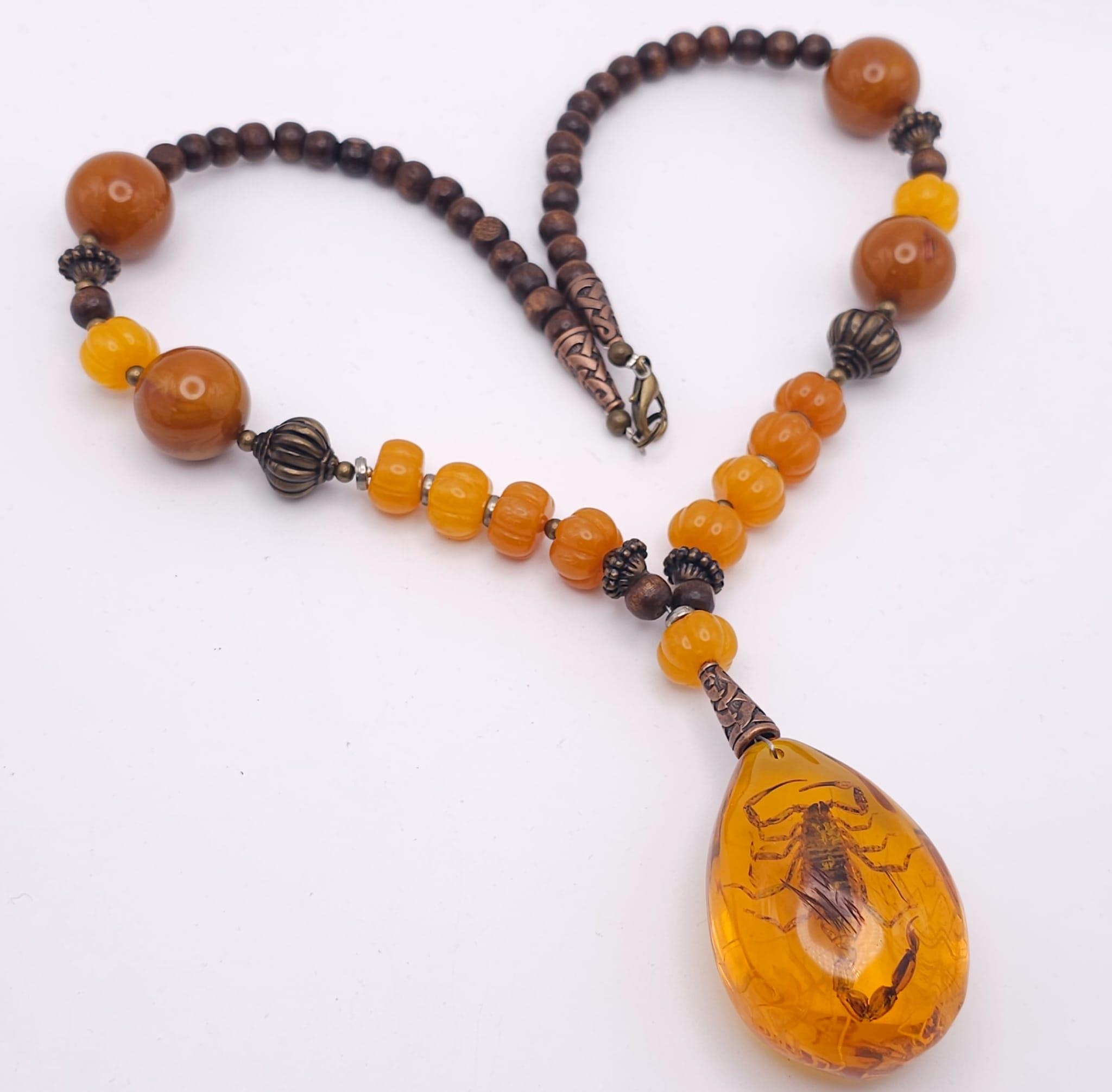 Two Amber Resin Statement Necklaces and Pendants. Both 56cm. - Image 2 of 16