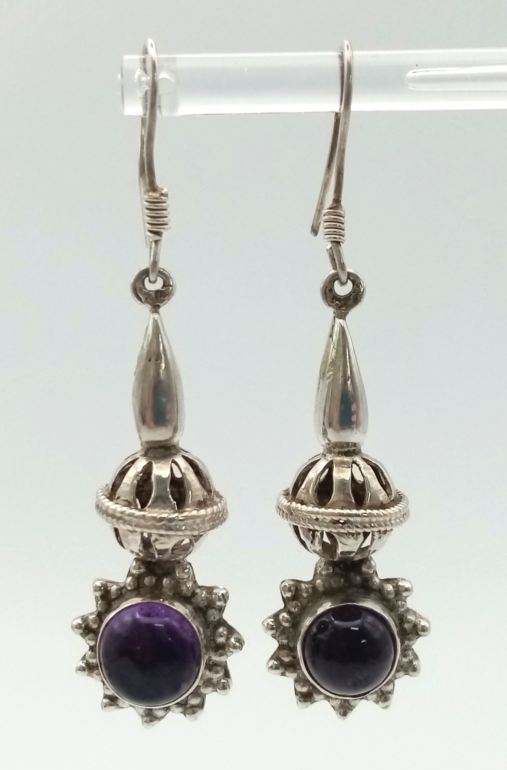 A Pair of Sterling Silver and Amethyst Drop Earrings. Decorative 4cm drops with amethyst cabochons. - Image 2 of 5