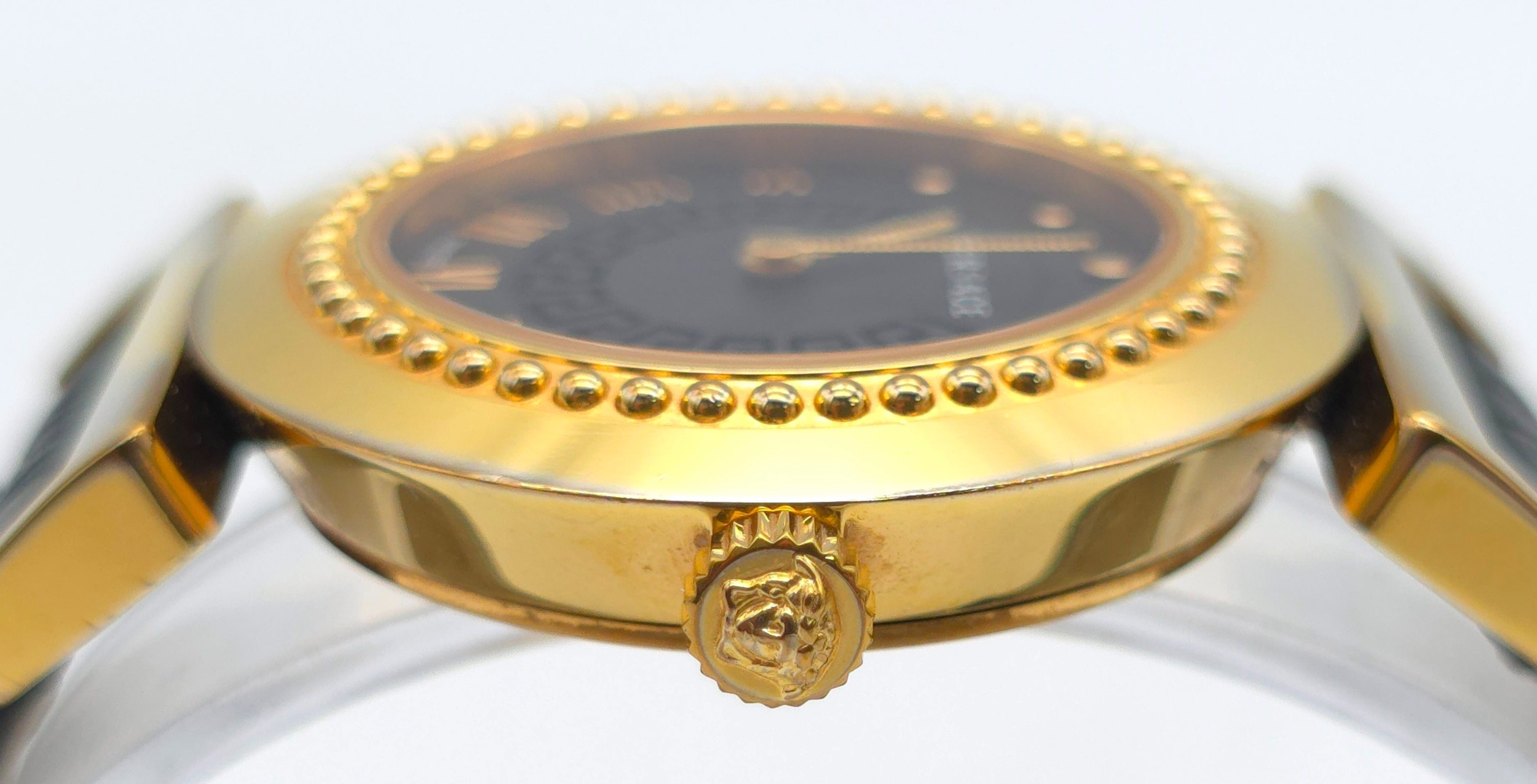 A Versace Designer Quartz Ladies Watch. Black leather and gilded strap and case - 35mm. Black dial - Image 7 of 8