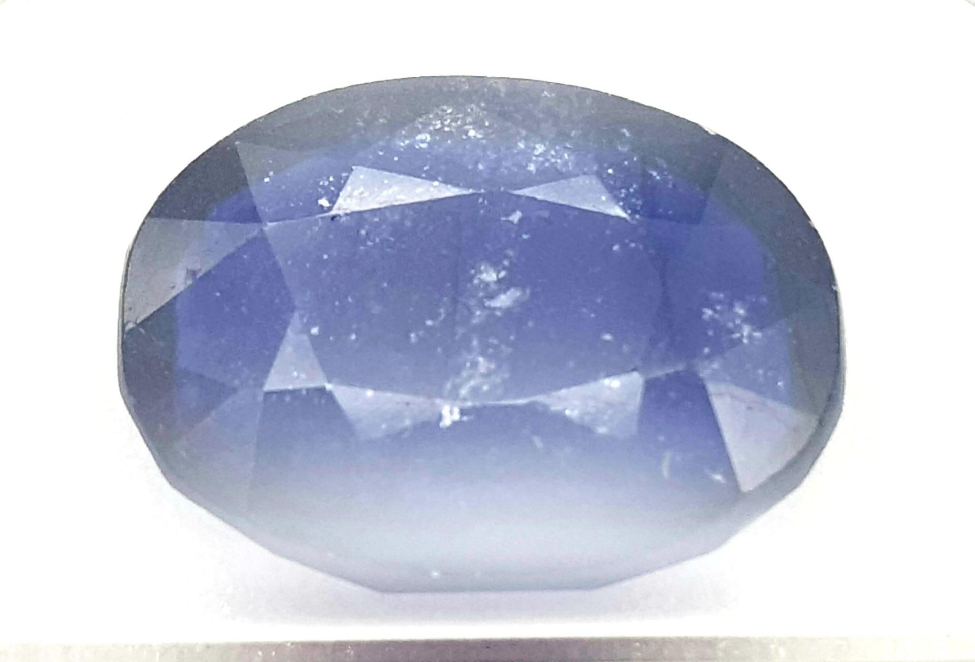 An 11.35ct Blue Sapphire - AIG Milan Certified in a Sealed Container.
