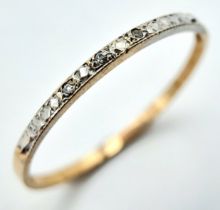 A 9K YELLOW GOLD(TESTED) DIAMOND BAND RING. 0.6G. SIZE P.