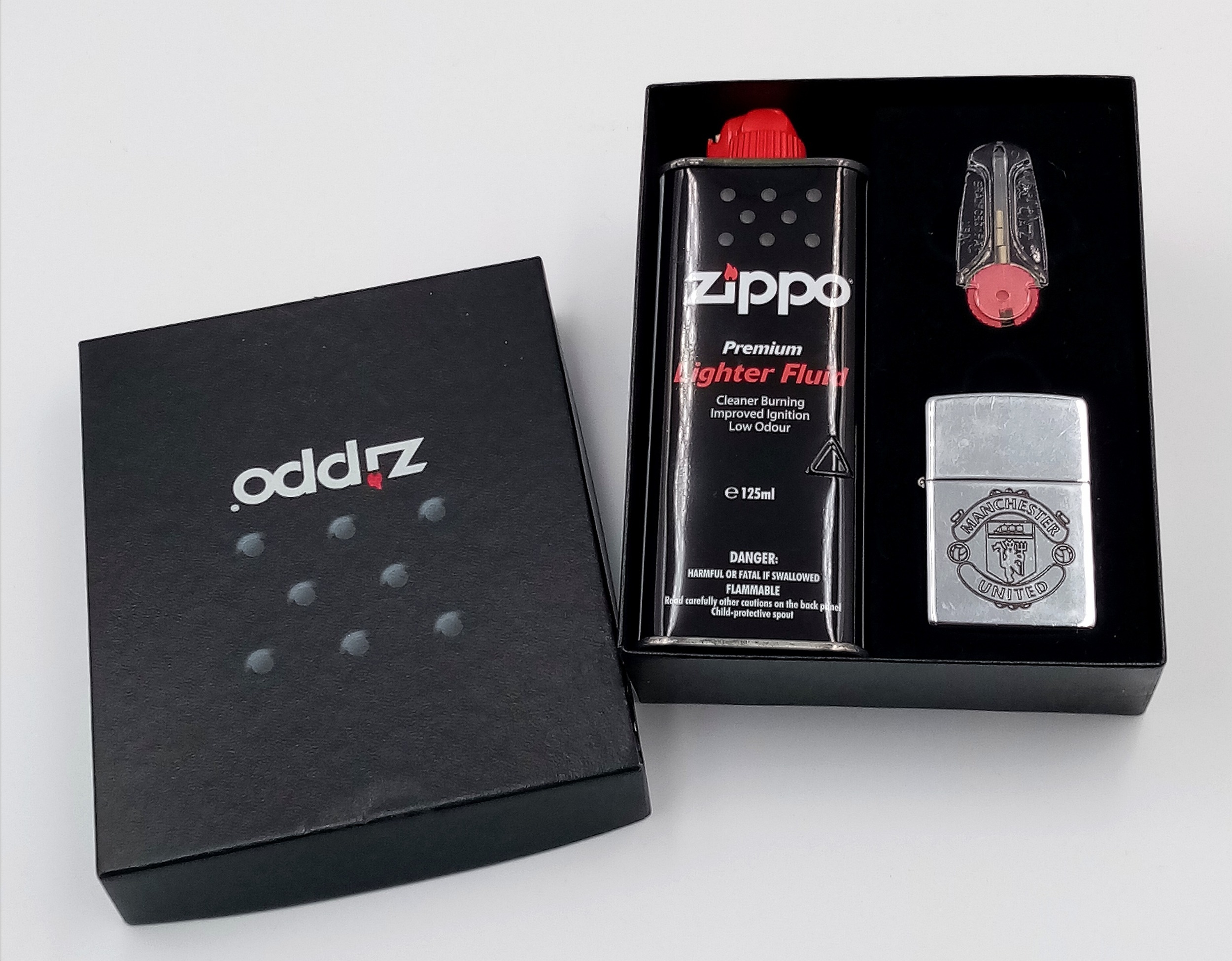 A Manchester United Zippo Lighter Box Set with Tool and Empty Lighter Fluid Can. UK MAINLAND SALES - Image 3 of 4