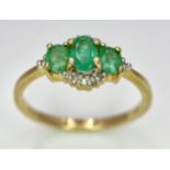 A 9K Yellow Gold 3 Stone Emerald and Diamonds Ring. Size M, 1.8g total weight.