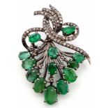 An Emerald and Diamond Decorative Floral Brooch with Emeralds - 7ctw and Diamonds 1.1ctw. 4cm. 5.