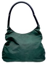 A Prada Green Tessuto Handbag. Textile exterior with plastic handle and velcro top closure. Black